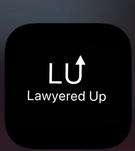 A black and white icon with the word " lawyered up ".